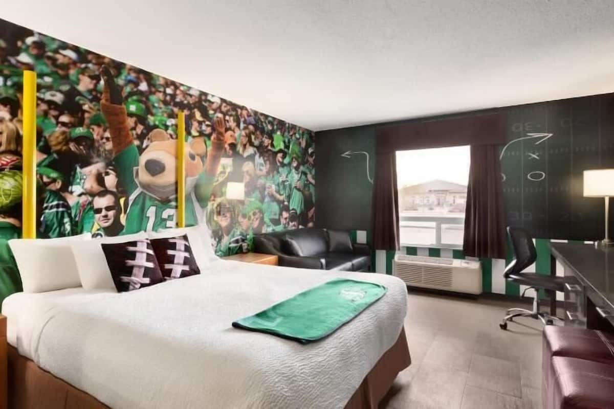 Desk, laptop workspace, blackout drapes, iron/ironing board