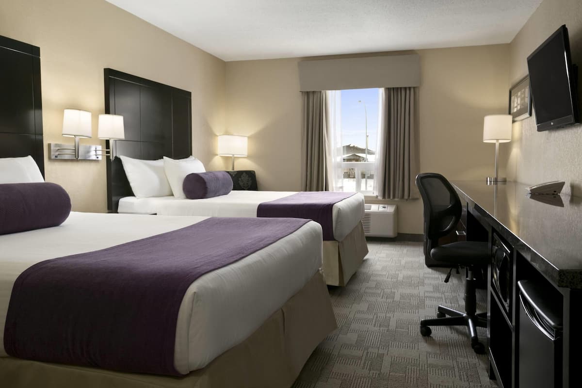 SIGNATURE 2 QUEEN AND 1 KING SUITE | Desk, laptop workspace, blackout curtains, iron/ironing board