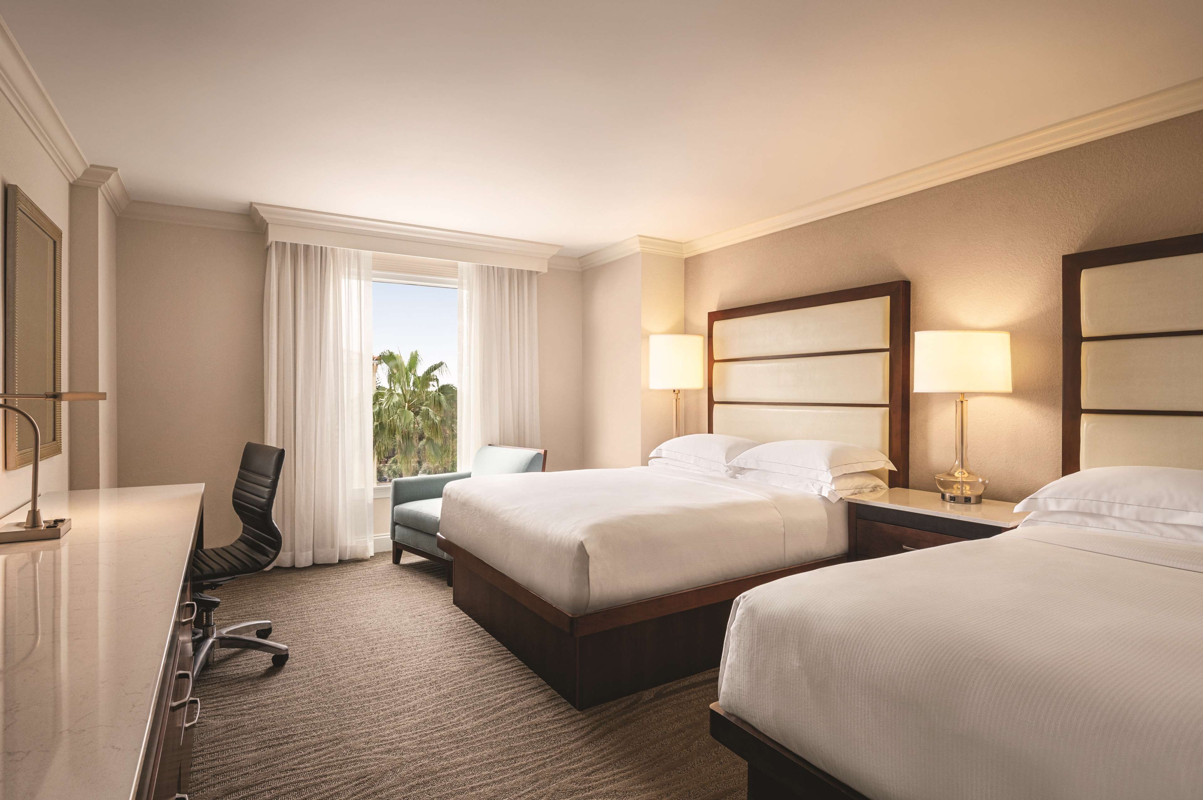 hypo-allergenic bedding, pillow-top beds, in-room safe, desk