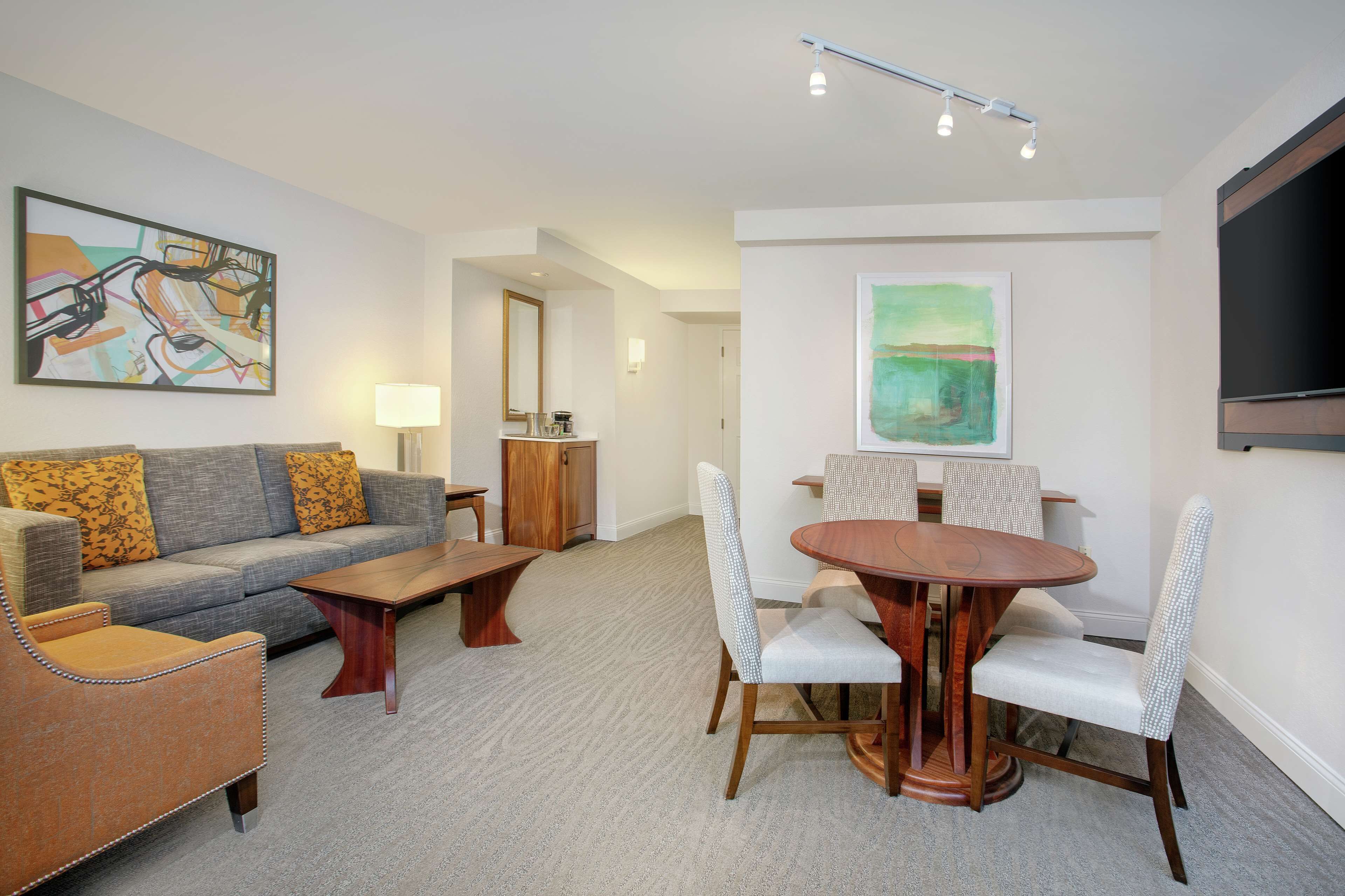 one bedroom suite | living area | 55-inch flat-screen tv with satellite channels, tv