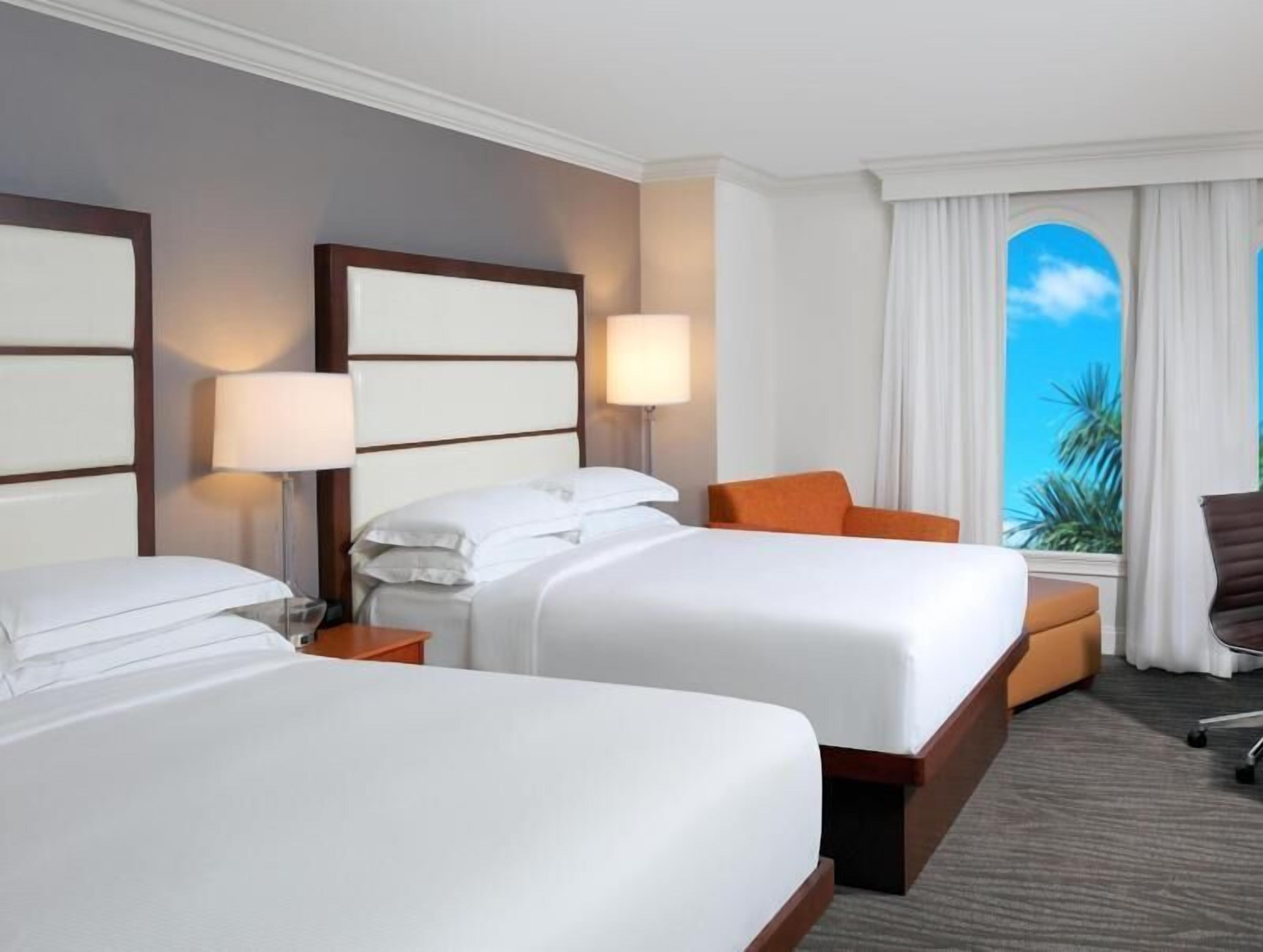 Hypo-allergenic bedding, pillowtop beds, in-room safe, desk