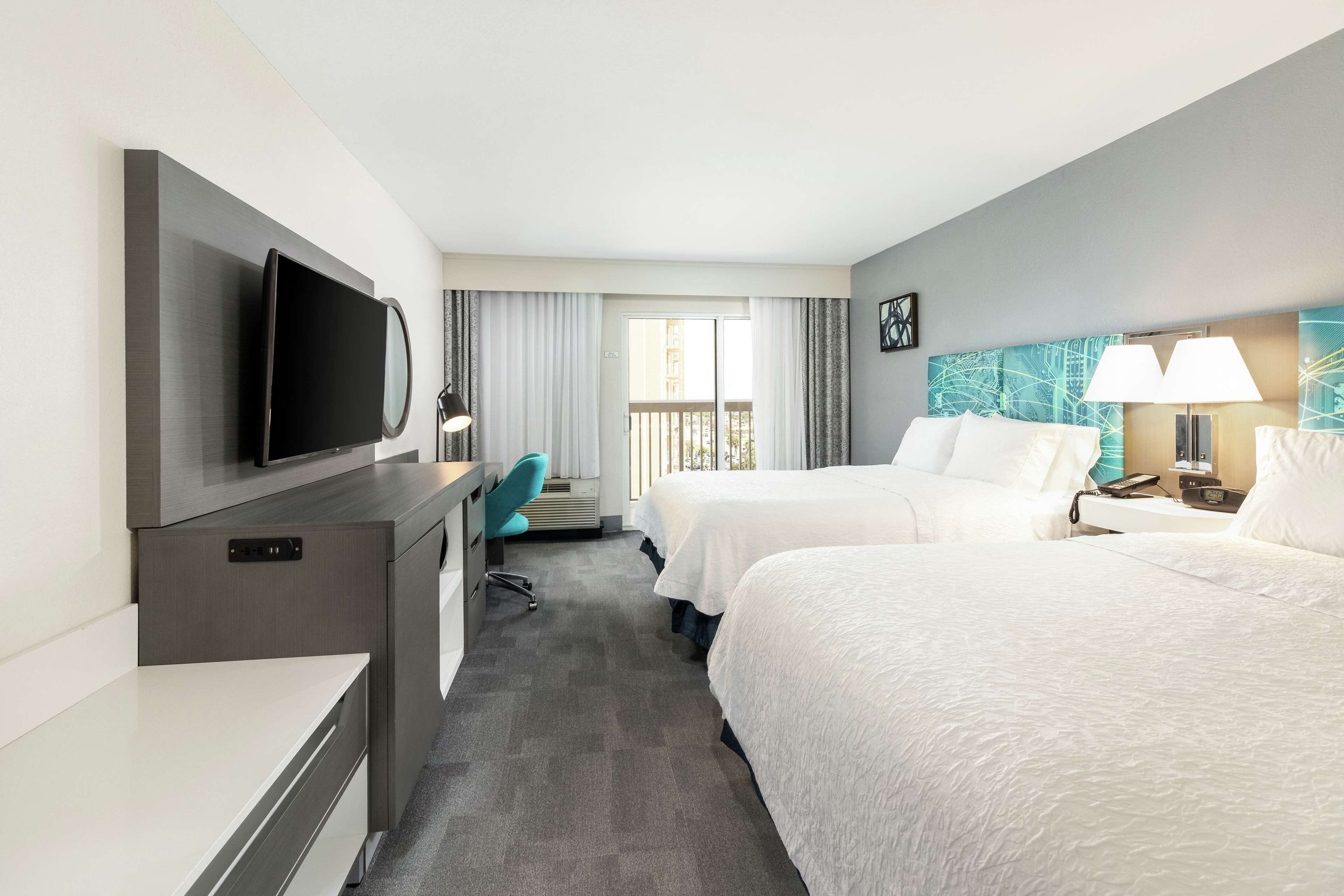 room, 2 queen beds, non smoking, partial ocean view | premium bedding, in-room safe, blackout curtains, iron/ironing board