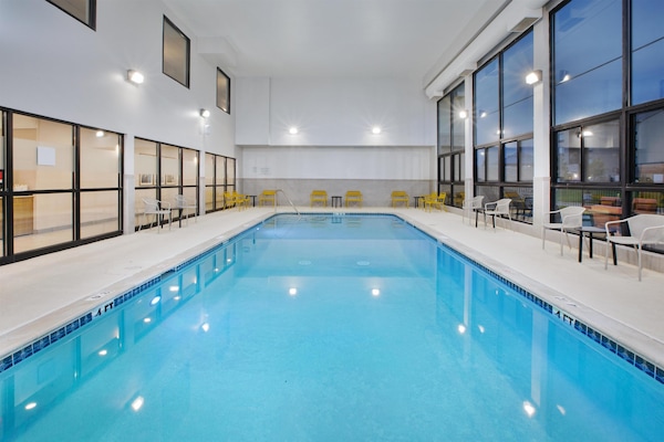 Indoor pool, open 8:00 AM to 10:00 PM, pool umbrellas, pool loungers