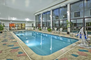 Indoor pool, open 9:00 AM to 10:00 PM, pool umbrellas, pool loungers