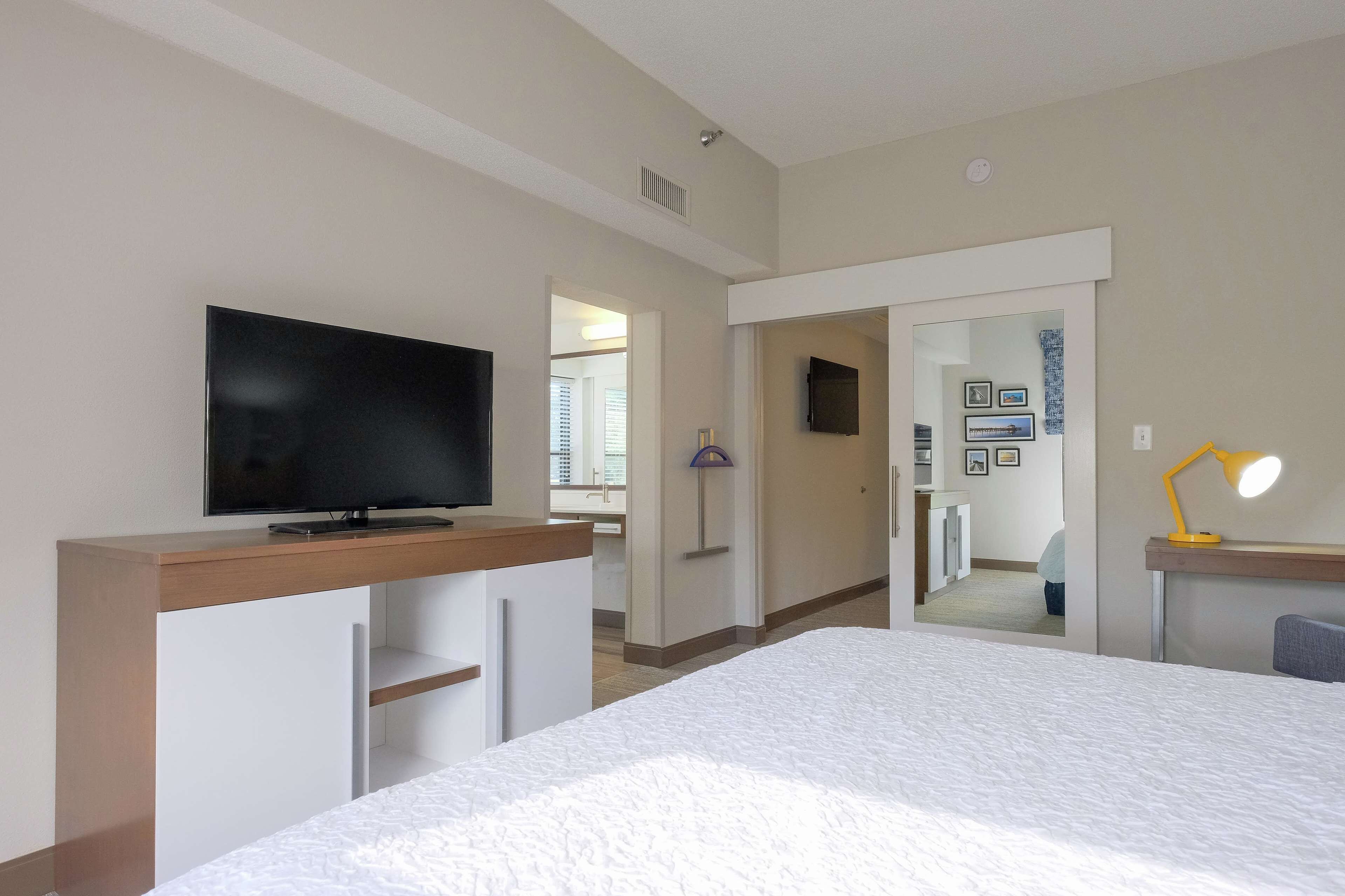 Suite, 1 King Bed, Accessible (Mobility & Hearing, Shower) | In-room safe, laptop workspace, blackout curtains, iron/ironing board