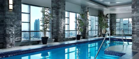 Indoor pool, open 6:00 AM to 10:00 PM, pool loungers