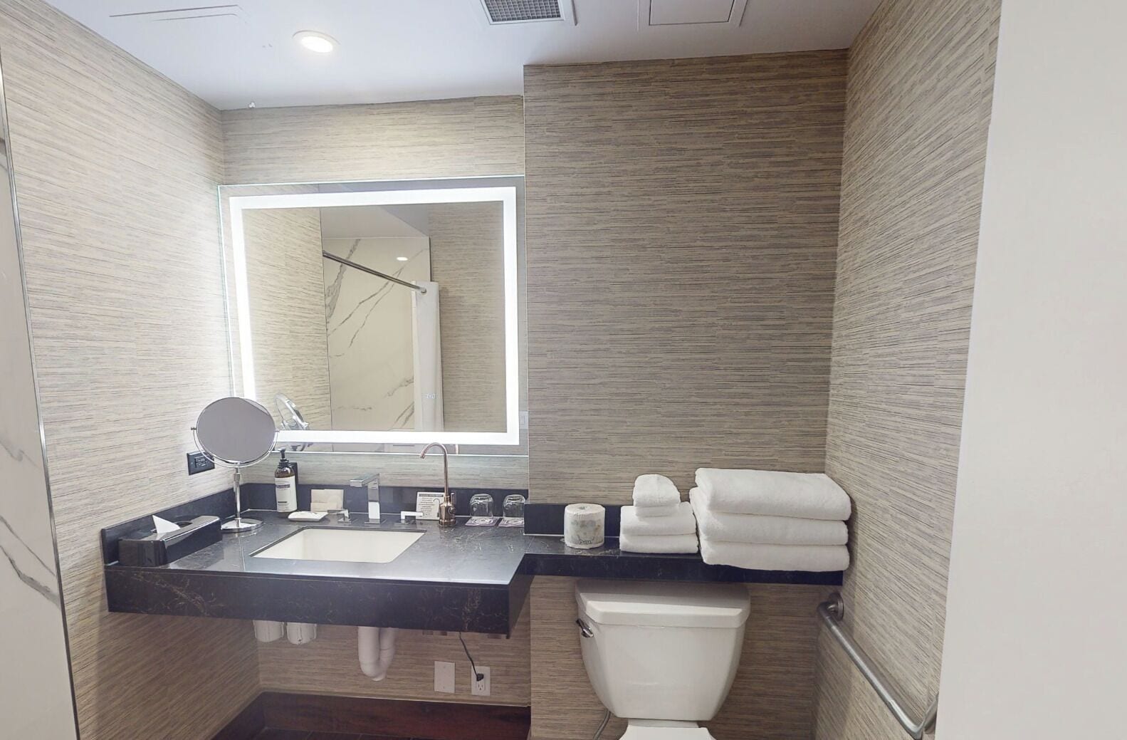 room, 1 king bed, roll-in shower | bathroom | designer toiletries, hair dryer, towels