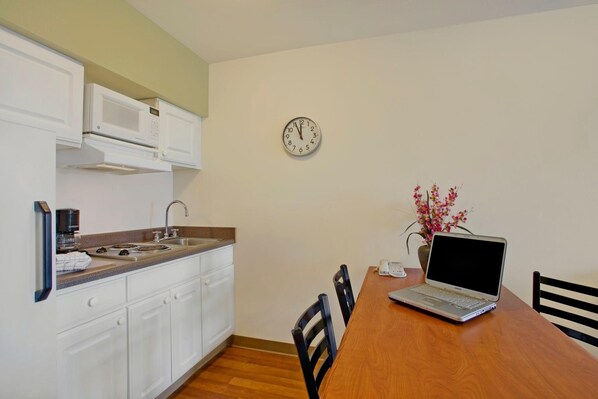 Fridge, microwave, stovetop, coffee/tea maker