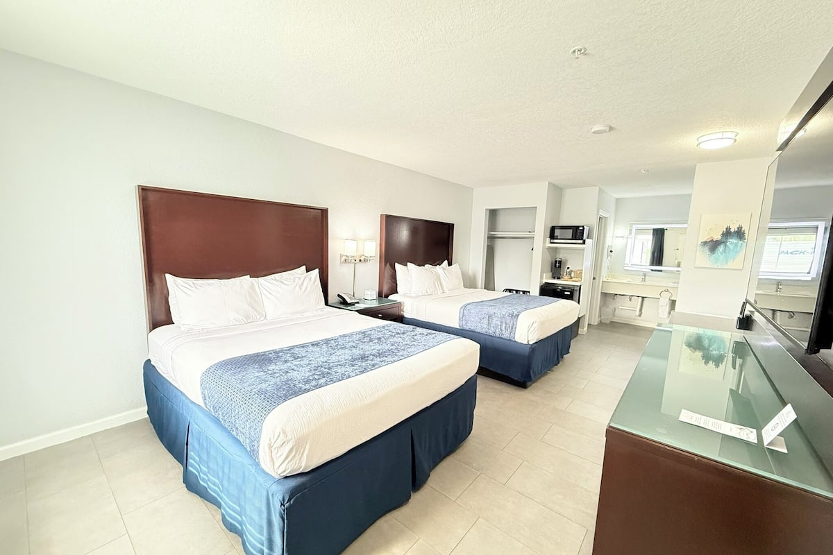 Standard Room, 2 Queen Beds, Non Smoking | Desk, laptop workspace, blackout drapes, iron/ironing board
