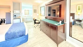 Desk, laptop workspace, blackout curtains, iron/ironing board