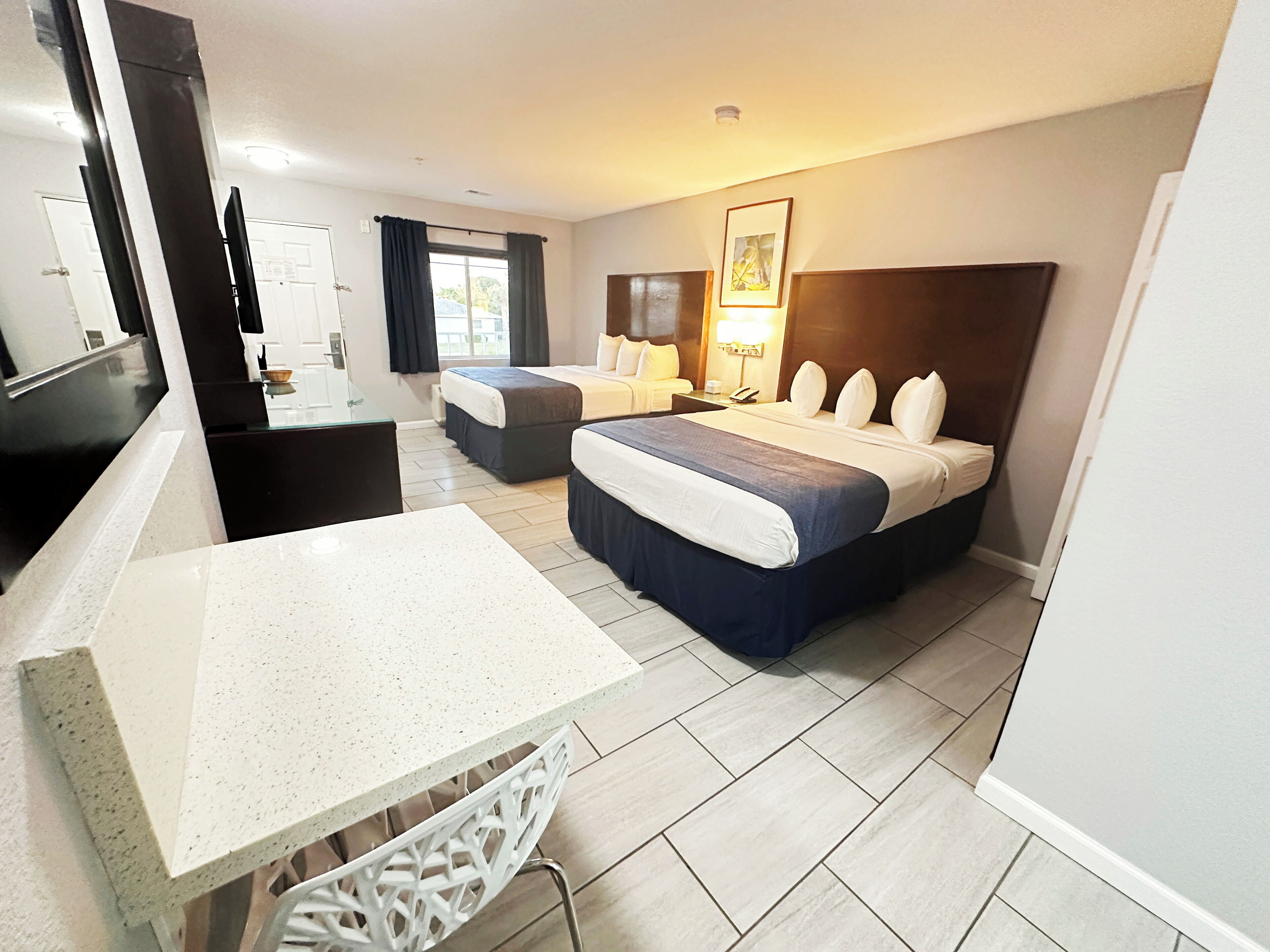 standard room, 2 queen beds, non smoking | blackout curtains, iron/ironing board, free wifi, bed sheets