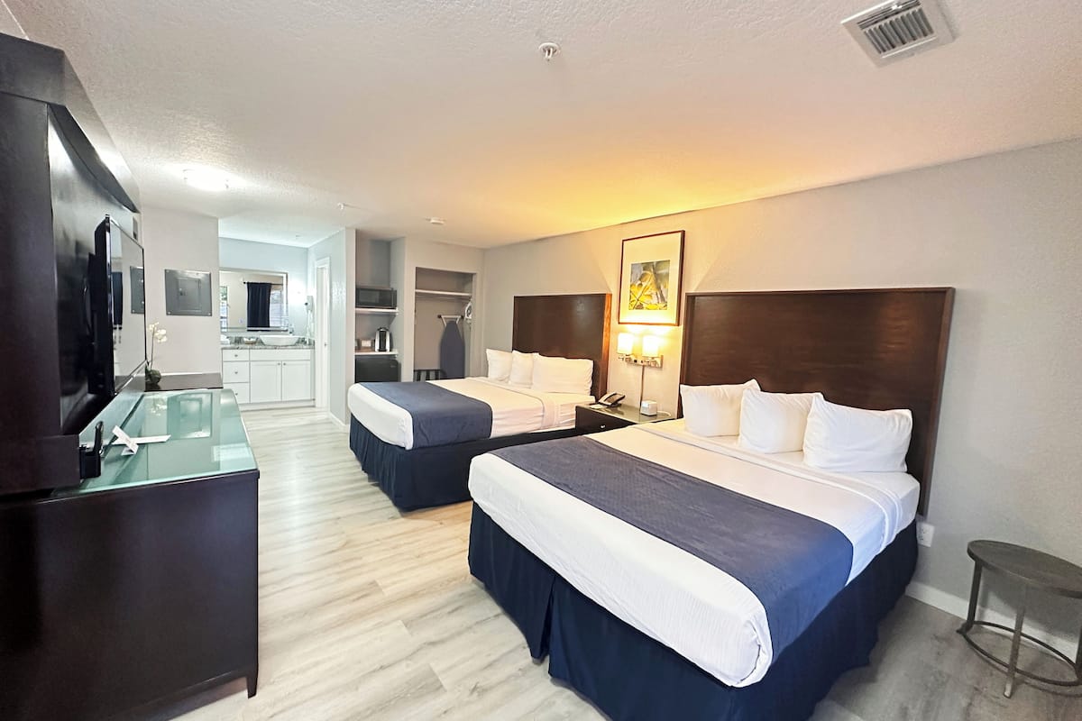 Deluxe Room, 2 Queen Beds, Non Smoking, Refrigerator & Microwave | Blackout drapes, iron/ironing board, free WiFi, bed sheets