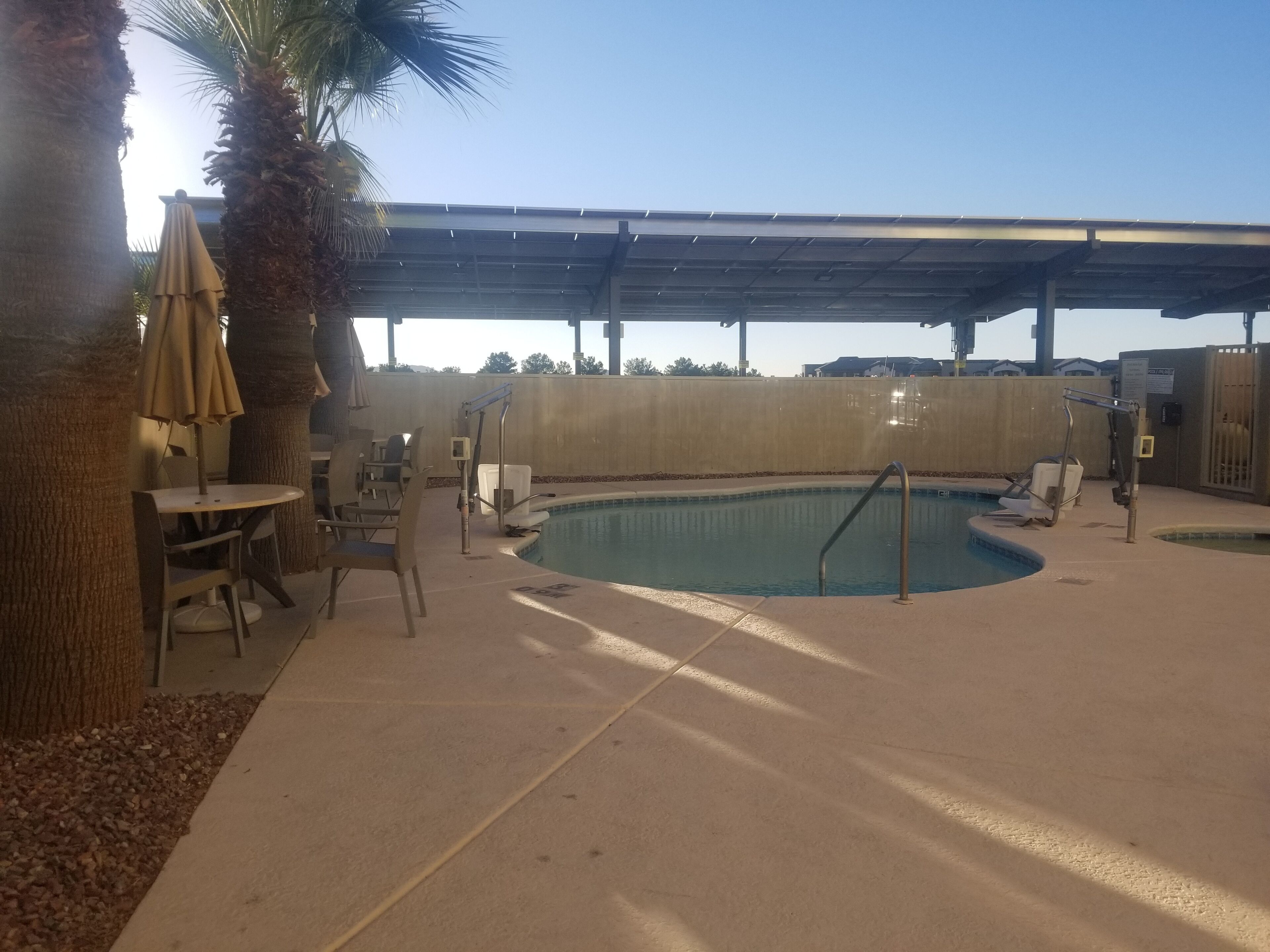 outdoor pool, open 8:00 am to 10 pm, pool loungers