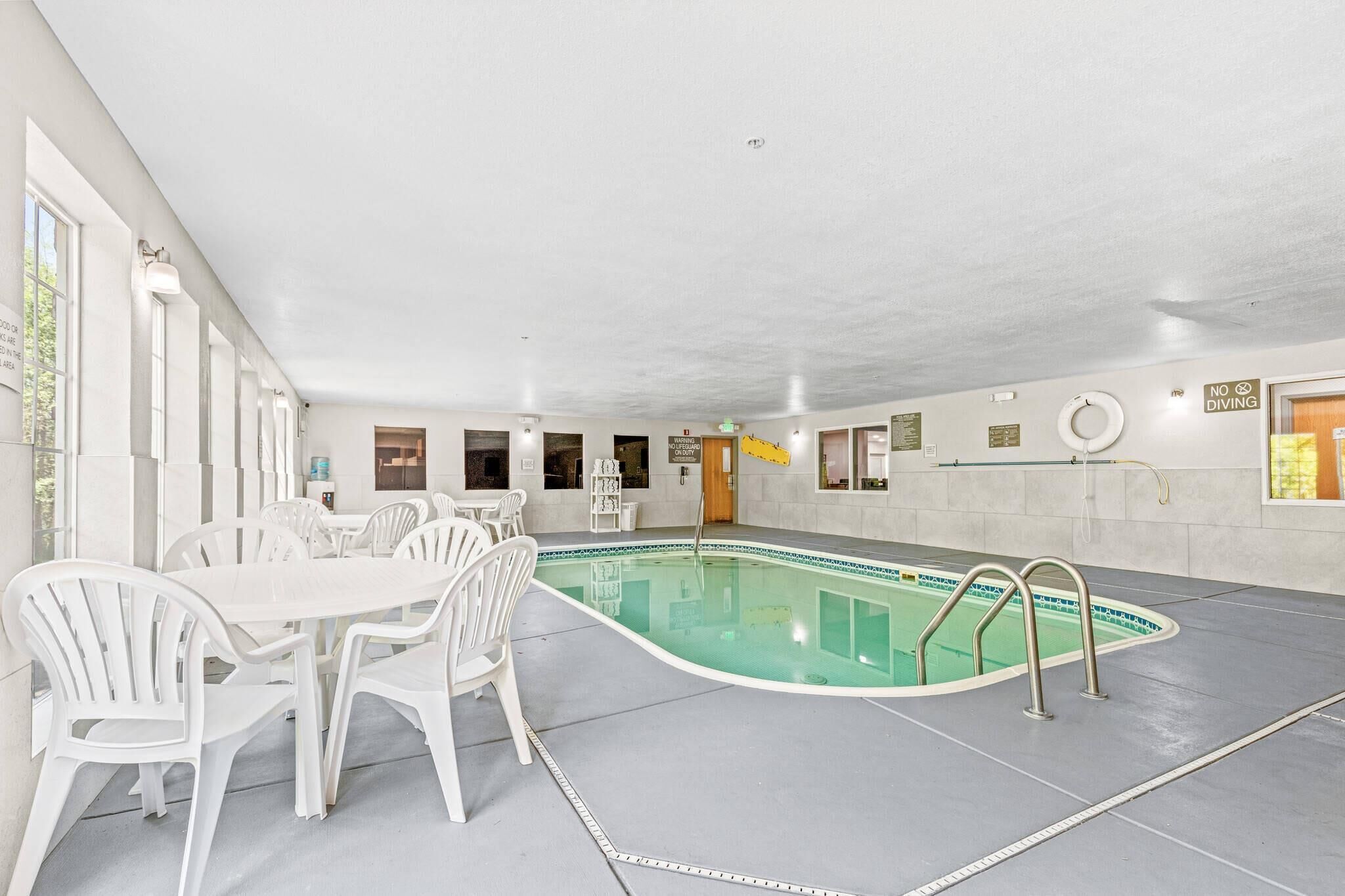 Indoor pool, open 10:00 AM to 10:00 PM, pool loungers