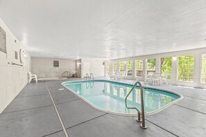 Indoor pool, open 10:00 AM to 10:00 PM, pool loungers