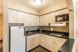 Suite, 1 King Bed, Non Smoking (Efficiency) | In-room safe, laptop workspace, blackout drapes, iron/ironing board