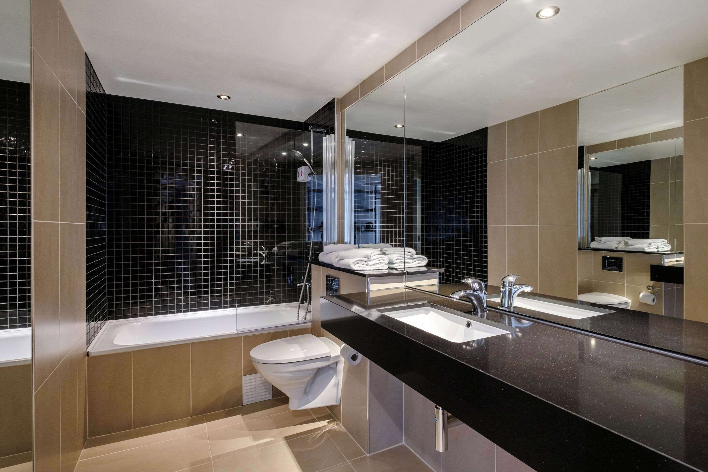 blackout curtains, iron/ironing board, bed sheets