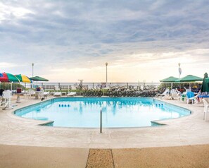 Seasonal outdoor pool, open 10 AM to 10 PM, pool loungers
