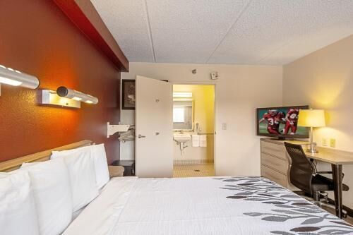 Desk, blackout curtains, free cots/infant beds, free WiFi