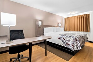 Habitación superior, 1 cama King size (Smoke Free) | Escritorio, cortinas blackout, cunas gratuitas y wifi gratis 