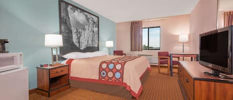 Desk, laptop workspace, blackout drapes, iron/ironing board