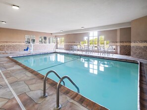 Indoor pool, open 9:00 AM to 10:00 PM, pool loungers