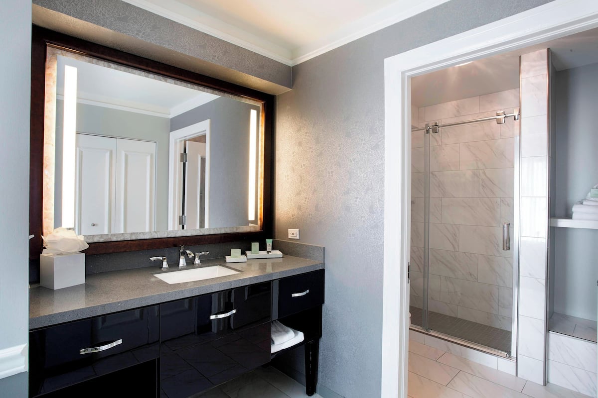 executive room, 2 queen beds | bathroom | shower, designer toiletries, hair dryer, bathrobes