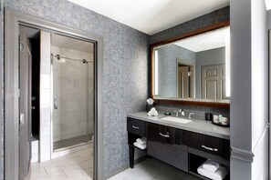 Shower, designer toiletries, hair dryer, bathrobes