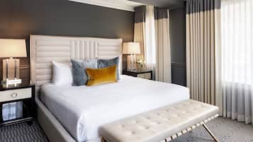 Relax in comfort with a plush bed and a convenient bedside table.