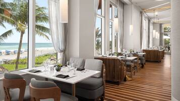 3 bars/lounges, poolside bar, beach bar