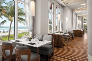 3 bars/lounges, poolside bar, beach bar