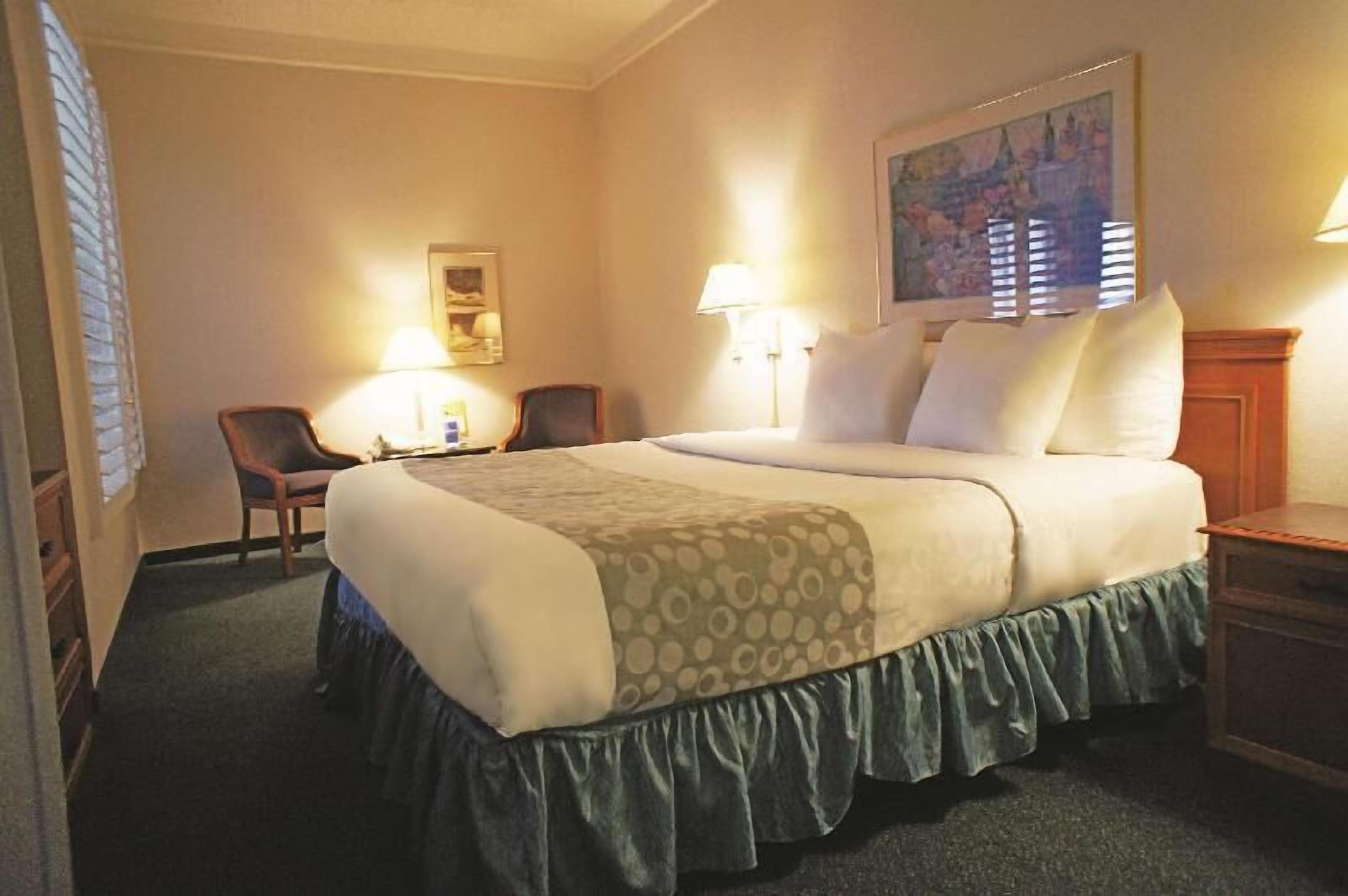 Premium bedding, desk, blackout drapes, iron/ironing board