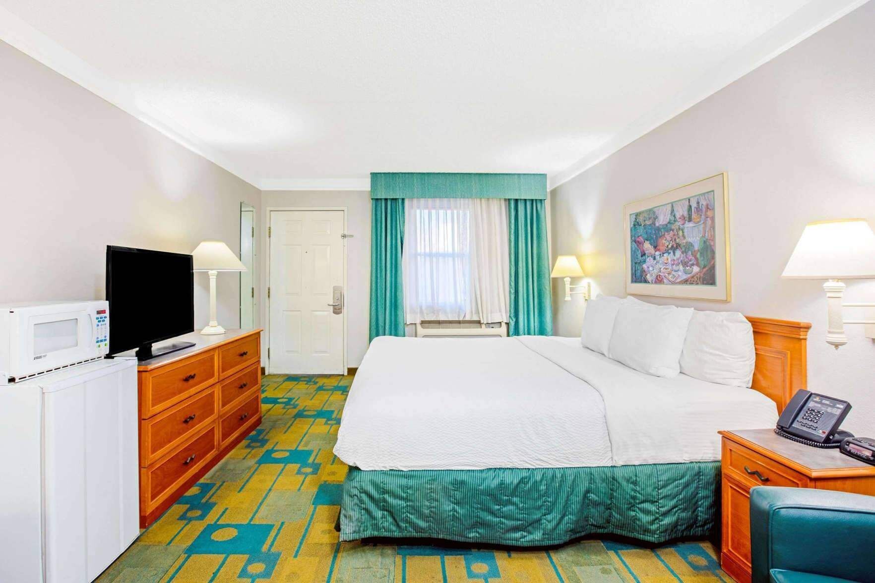 Premium bedding, desk, blackout drapes, iron/ironing board