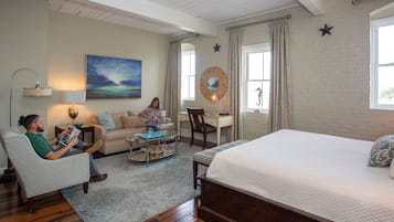 Suite, 1 King Bed (Street View) - Stair Access Only | Living area | 32-inch flat-screen TV with cable channels, TV