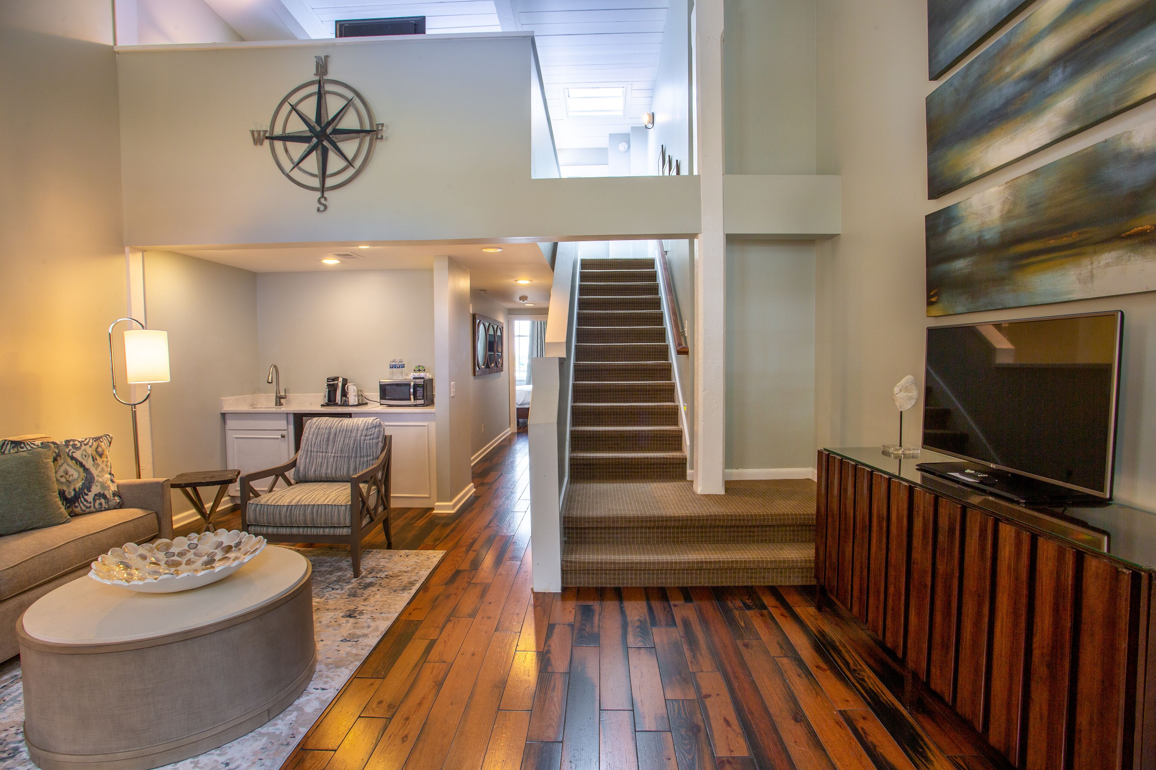 suite, multiple bedrooms, river view | living area | 32-inch flat-screen tv with cable channels, tv, mp3 dock