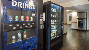 Vending machines labeled 'COLD DRINKS' with various beverage options. - Red Roof Inn Columbus - Ohio State Fairgrounds (Columbus)