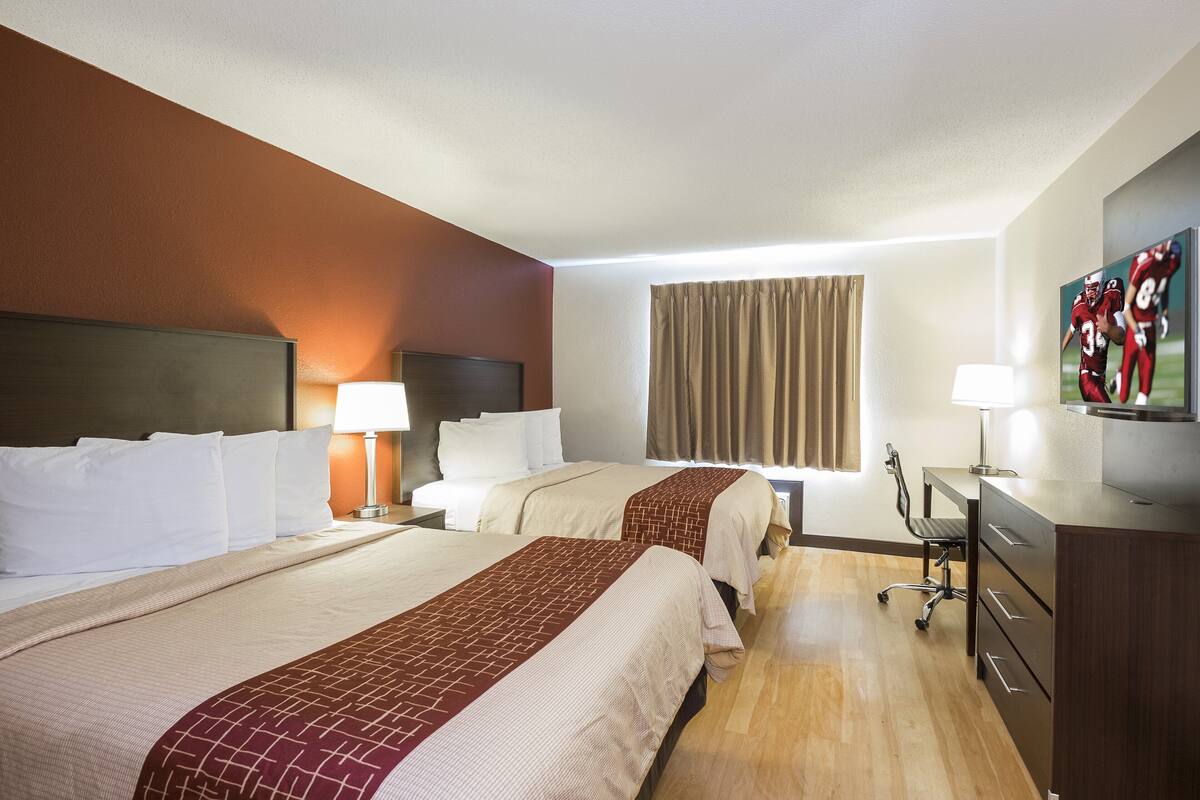 Pillowtop beds, desk, laptop workspace, blackout drapes