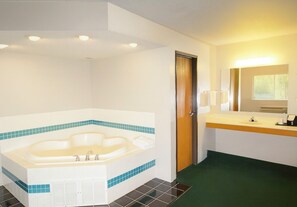 Suite, 1 King Bed, Non Smoking (Efficiency) | Bathroom | Hair dryer, towels