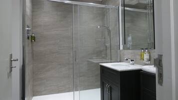Superior Double Room | Bathroom | Designer toiletries, hair dryer, towels