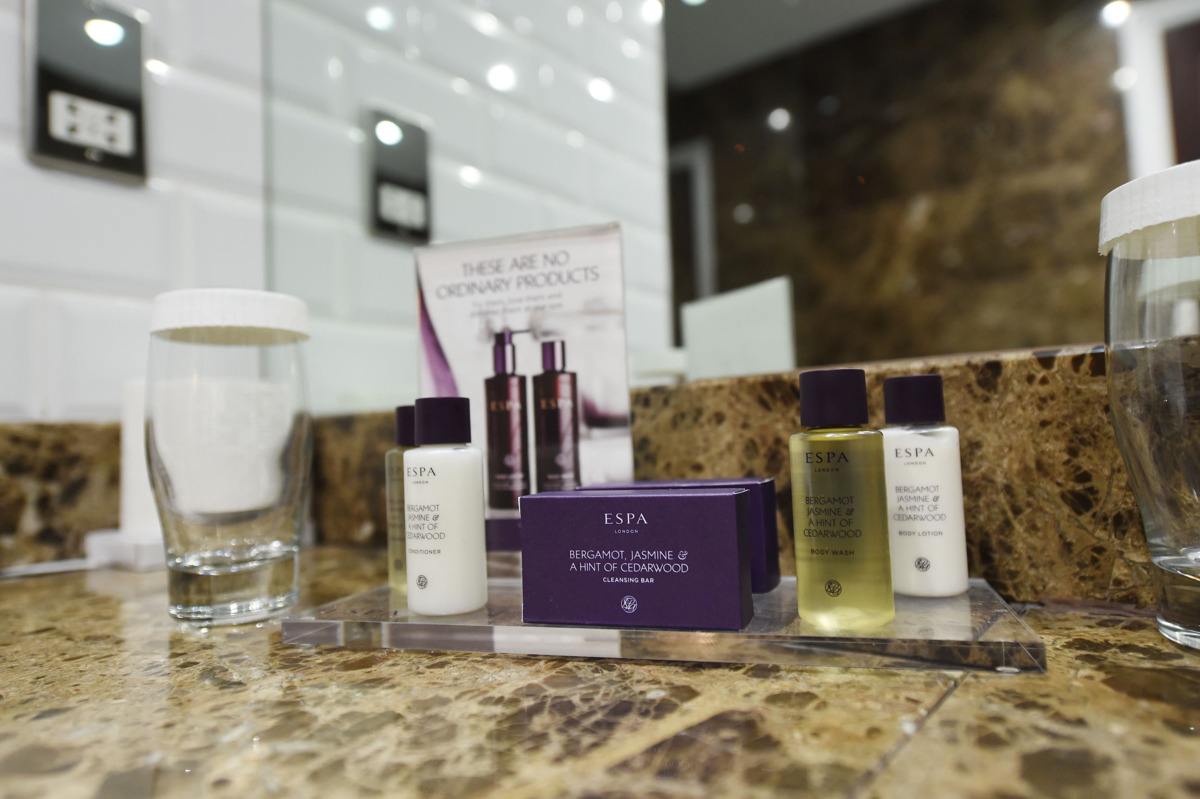 combined shower/bathtub, free toiletries, hair dryer, slippers