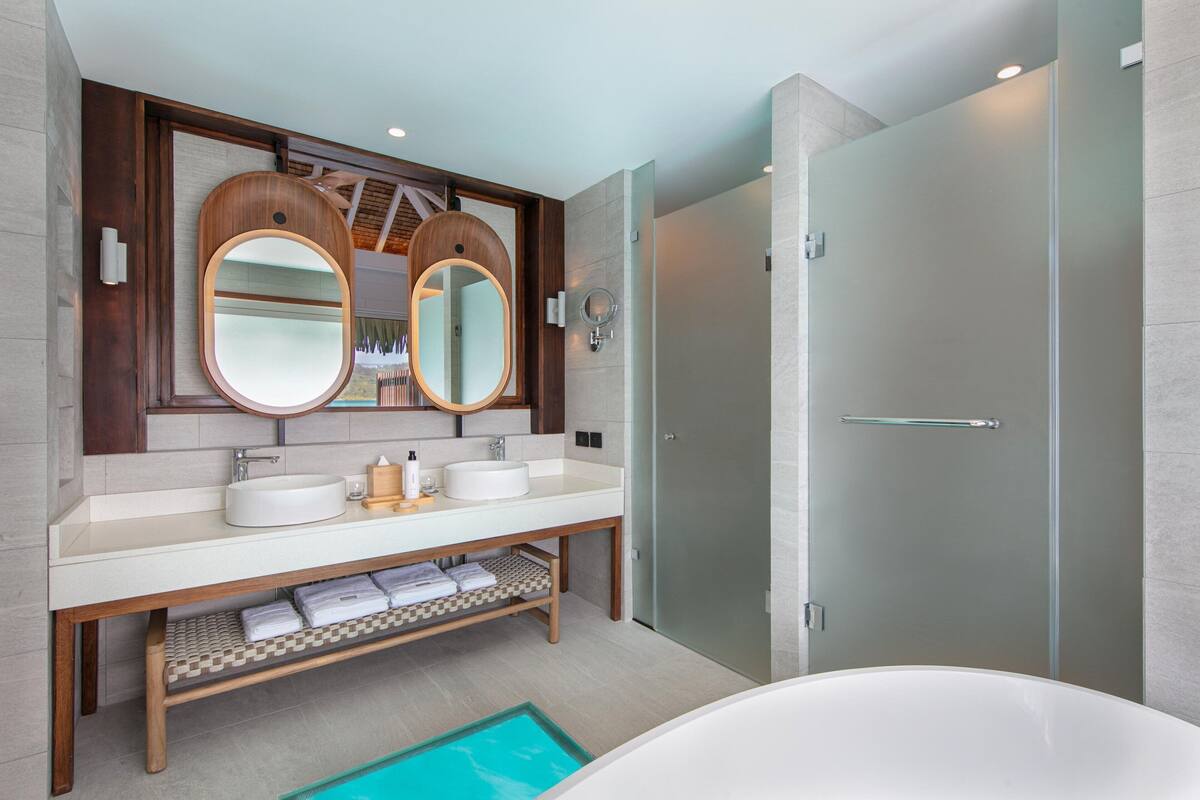 separate bathtub and shower, hair dryer, bathrobes, slippers