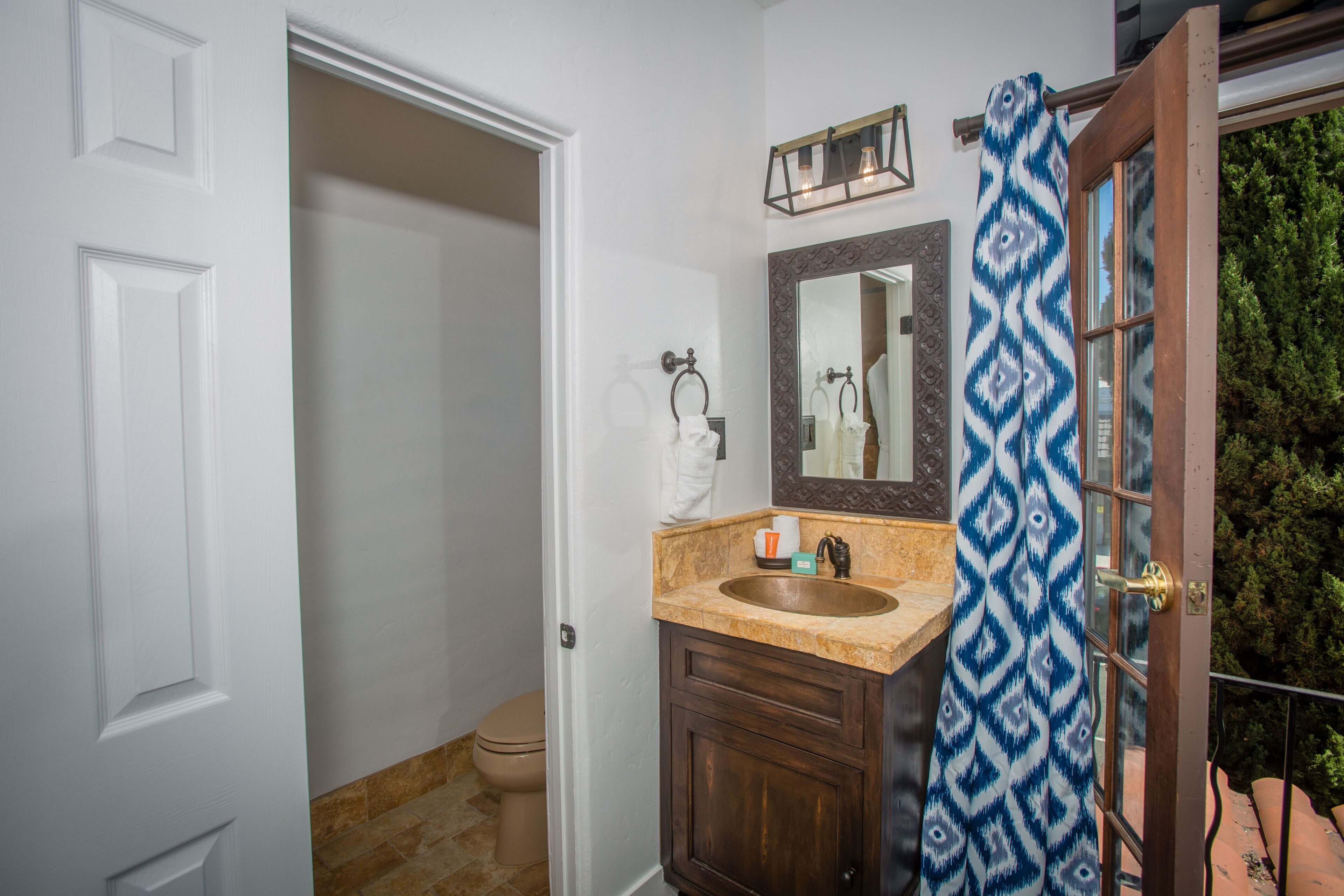 designer toiletries, hair dryer, bathrobes, towels