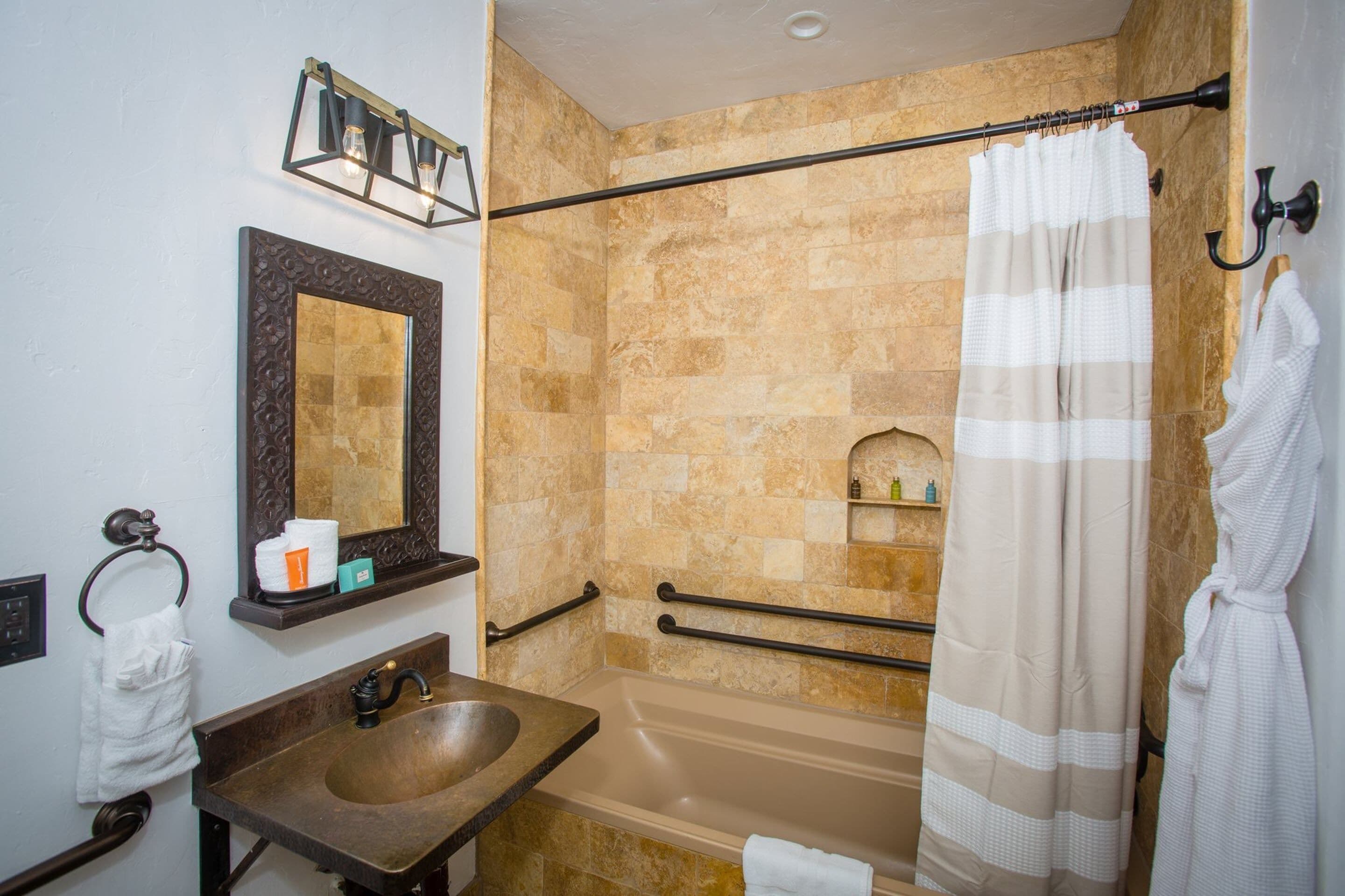 designer toiletries, hair dryer, bathrobes, towels