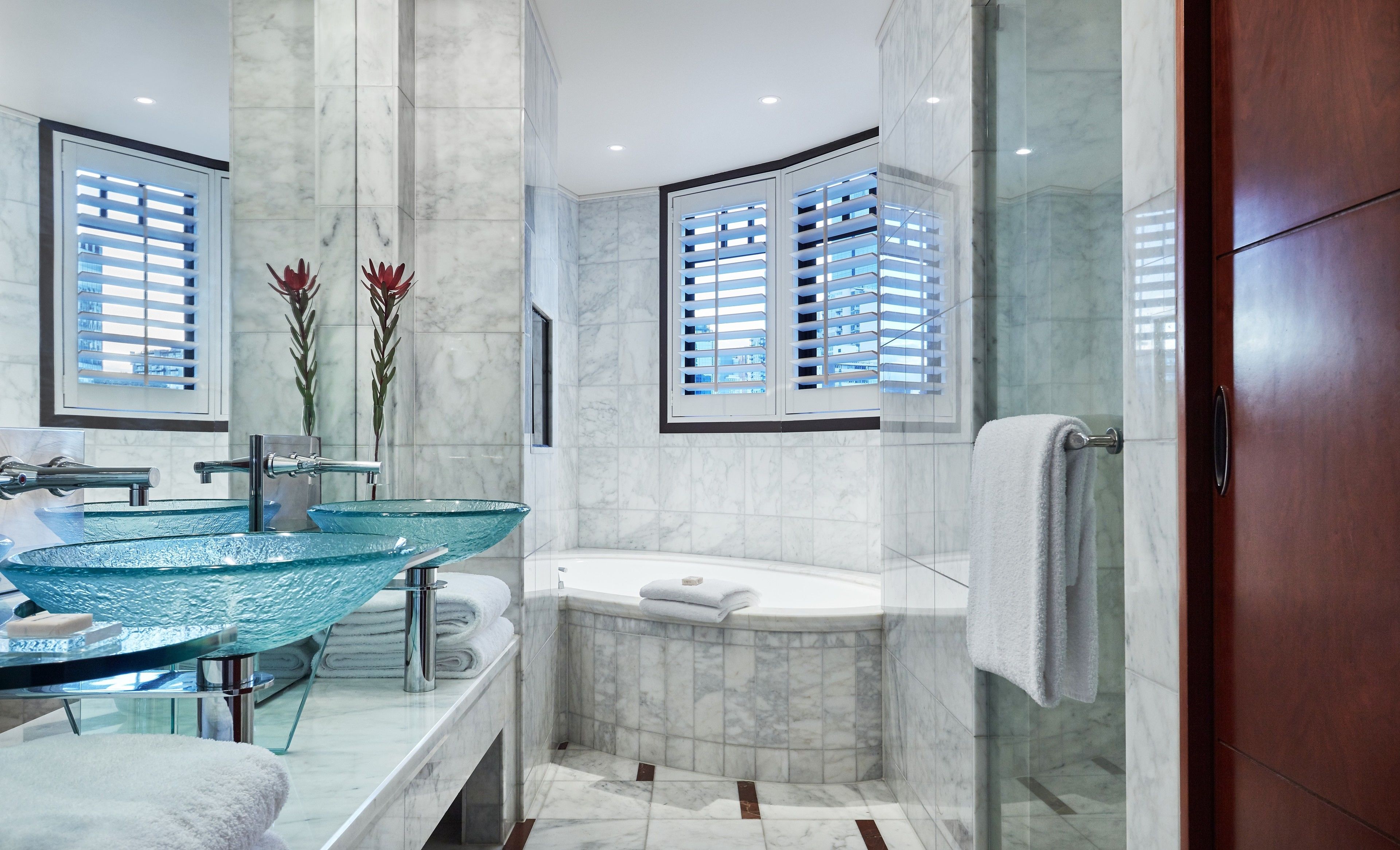 separate bathtub and shower, deep-soaking bathtub, rainfall showerhead