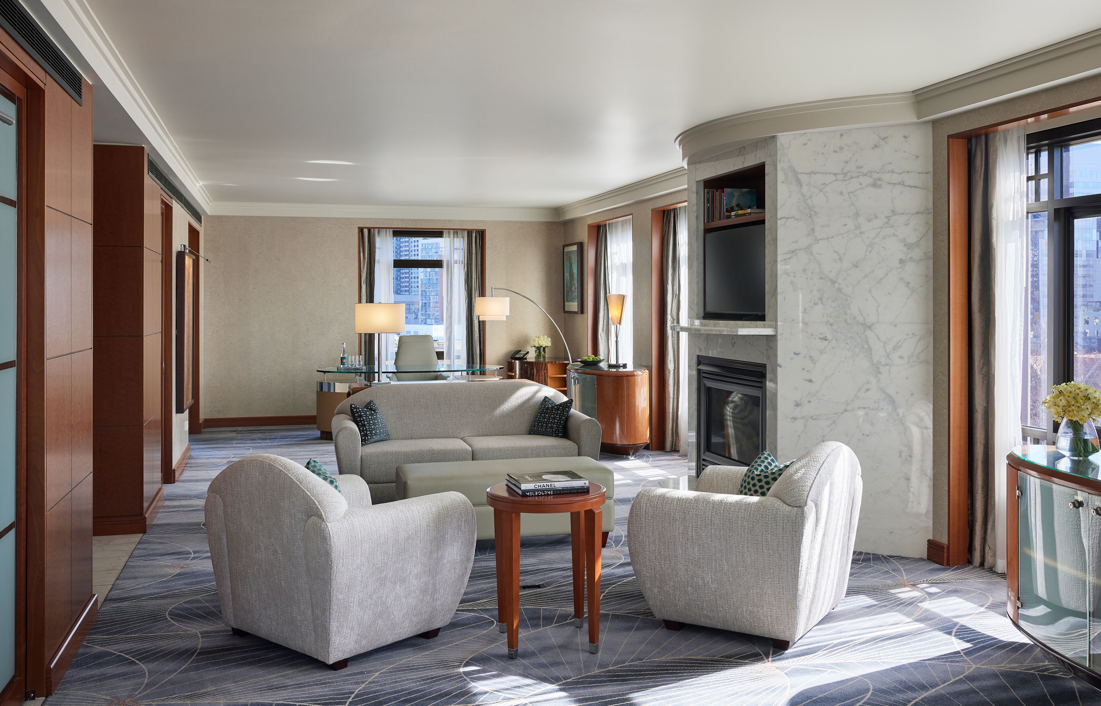 suite (ambassador) | living area | 32-inch lcd tv with digital channels, tv, ipod dock