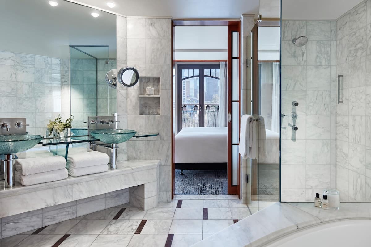 separate bathtub and shower, deep-soaking bathtub, rainfall showerhead