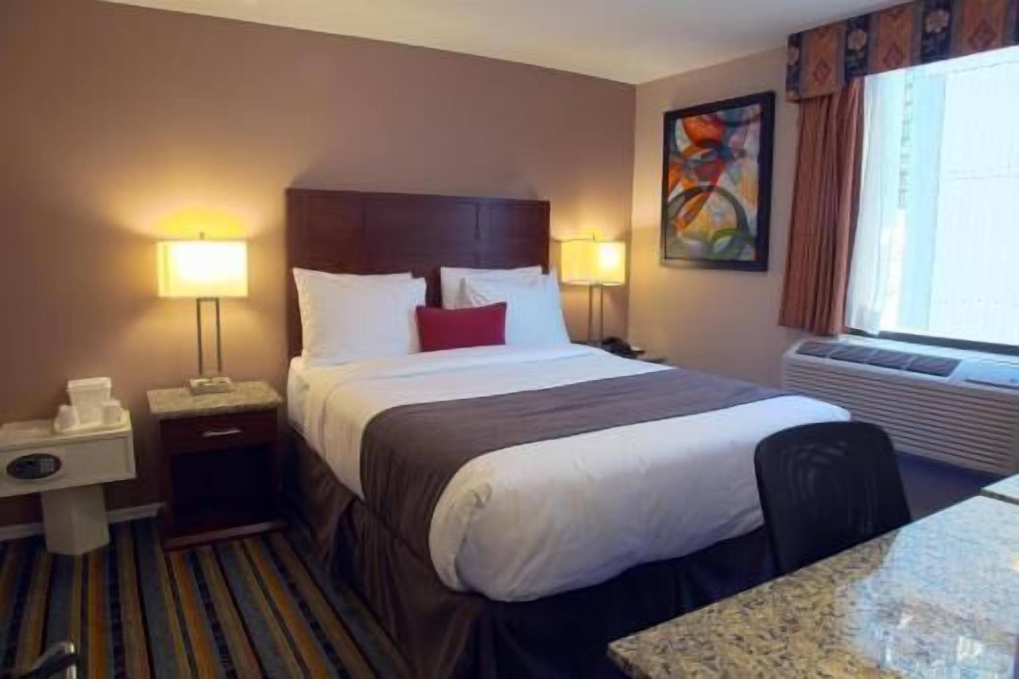 Premium bedding, pillowtop beds, in-room safe, individually furnished