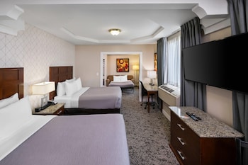 Suite, Multiple Beds, Non Smoking | Premium bedding, pillowtop beds, in-room safe, individually furnished at Quality Inn & Suites