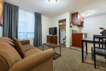 Suite, 1 Queen Bed with Sofa bed, Non Smoking | Premium bedding, pillowtop beds, in-room safe, individually furnished at Quality Inn & Suites