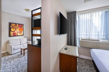 Suite, Multiple Beds, Non Smoking | Premium bedding, pillowtop beds, in-room safe, individually furnished at Quality Inn & Suites